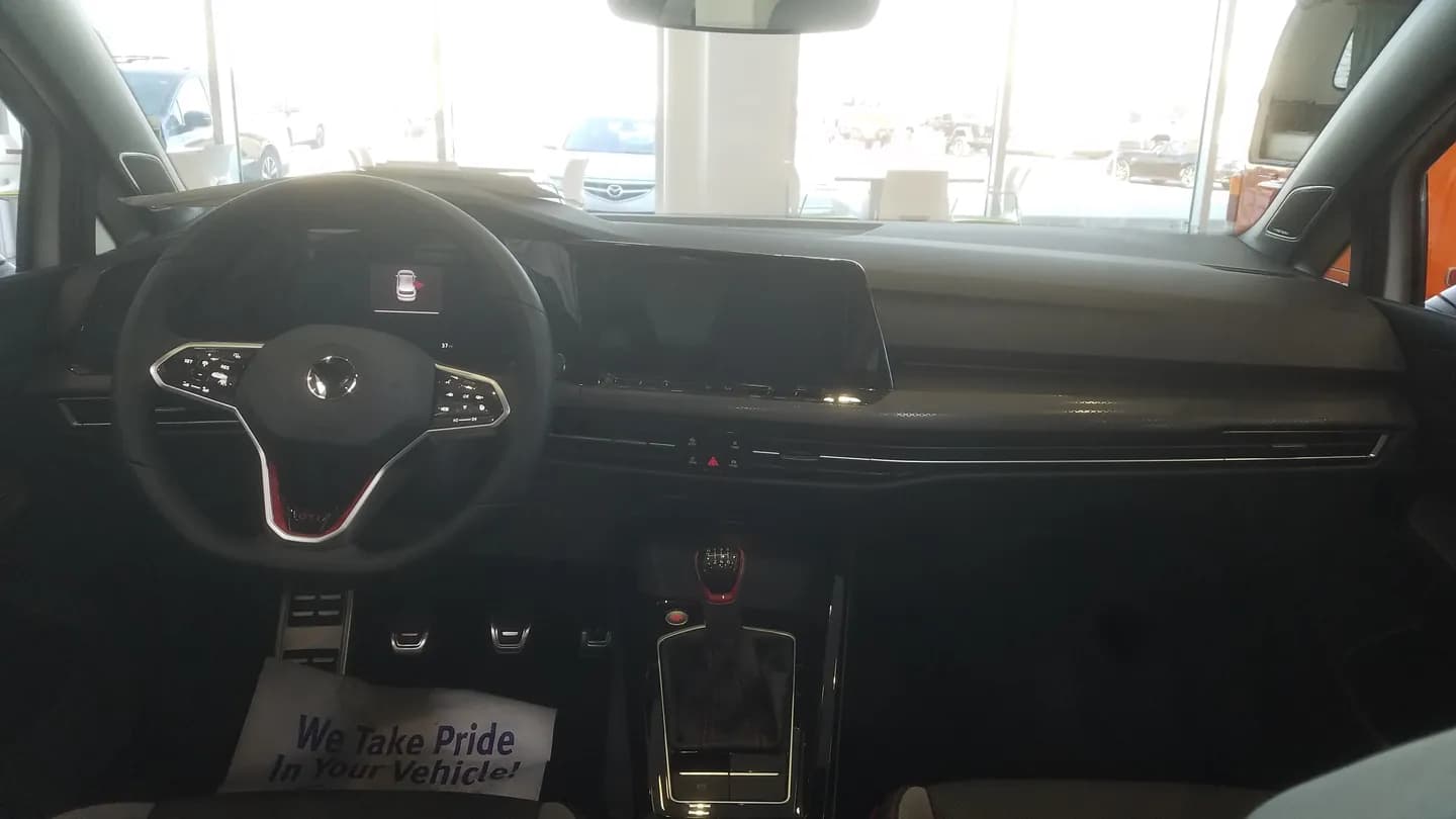 2023 Volkswagen Golf GTI dashboard and steering wheel