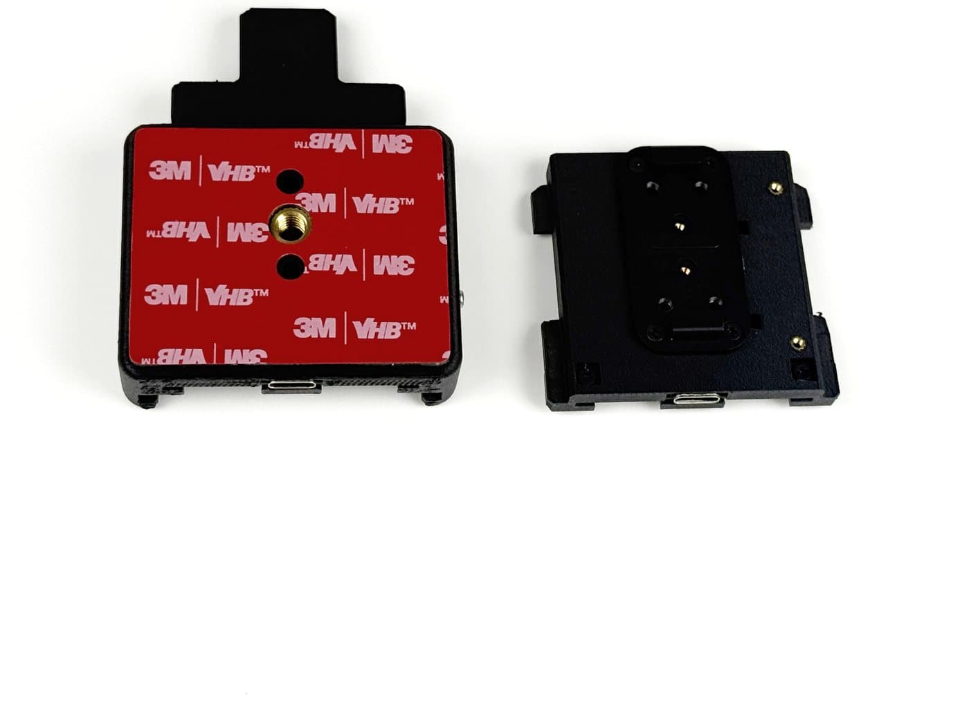 The two halves of the BearTech Side Slidemount for comma four
