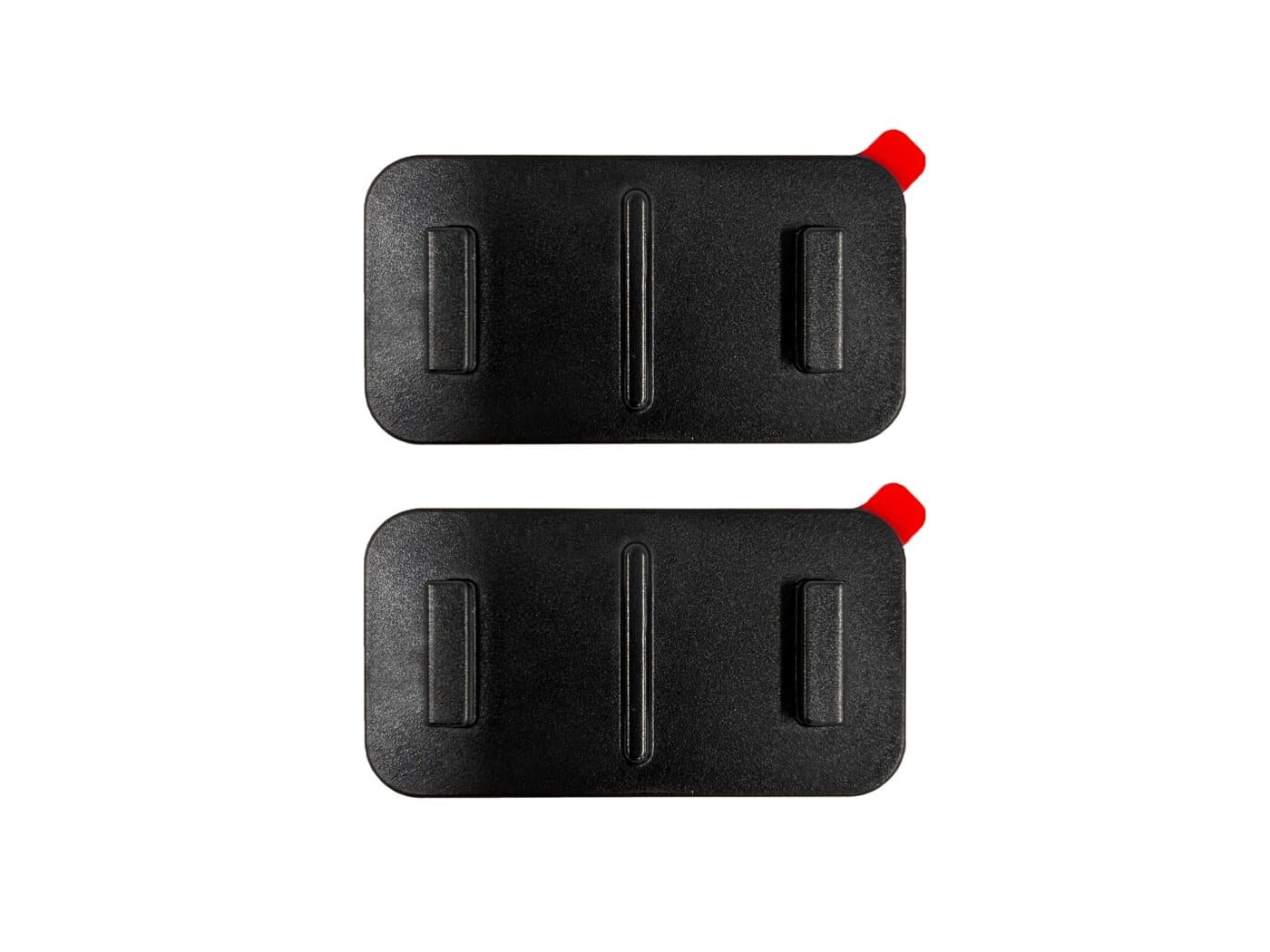 Two official comma four mounts with their tape backing