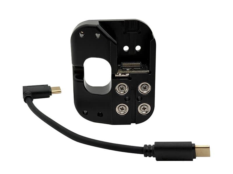 The comma four device-side half of the Mag Mount with its short cable